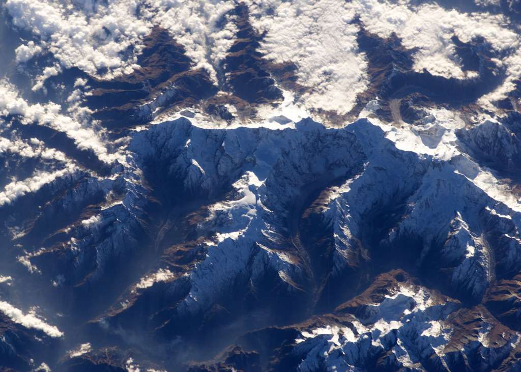Manaslu 00 03 Nasa ISS008-E-6343 Close Up Nasa has some excellent images of Manaslu. Here is a view from the south east, with Manaslu (8163m) on the far right with the large sunlit plateau. To the left is the pointy peak, Ngadi Chuli (7871m, Peak 29), and then further to the left Himal Chuli (7893m).